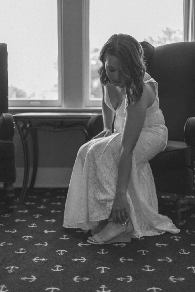 bride putting on her shoes