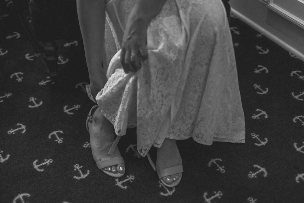 bride putting on her shoes