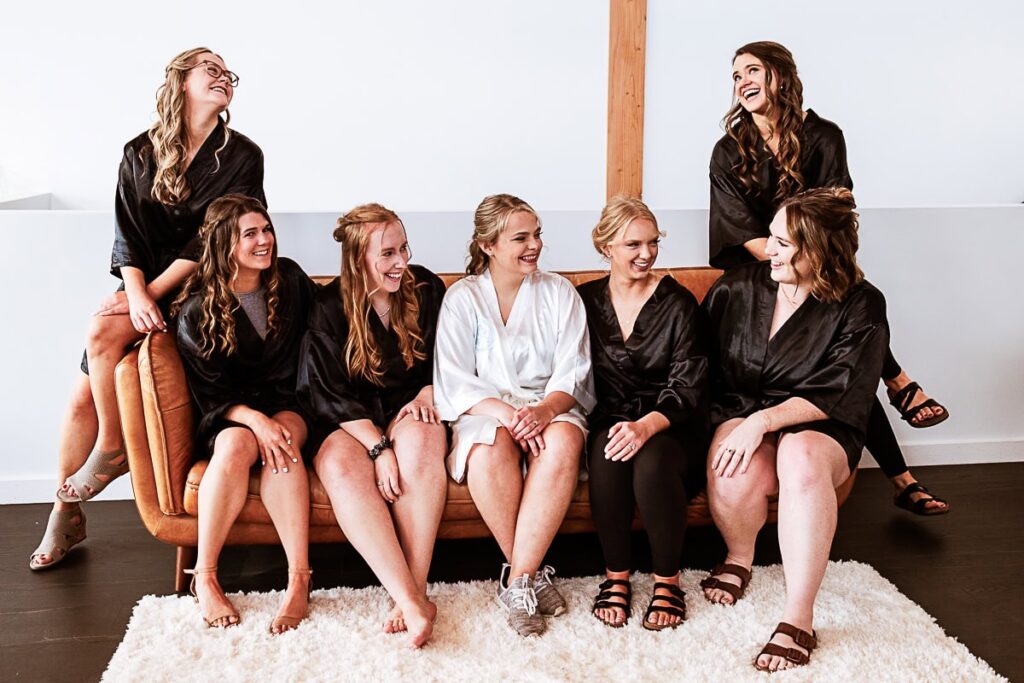 ladies sitting on a couch before wedding day at ivy black saginaw mn near duluth